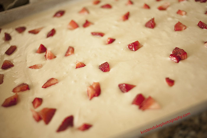 white cake with fresh strawberries