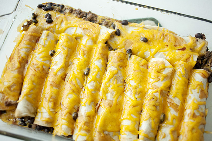 Black Bean and Beef Enchiladas covered in cheese