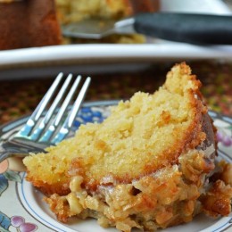An intensely moist and sweet gluten free pineapple coconut bundt cake topped with a broiled brown sugar, coconut, and macadamia frosting for the perfect crunch.