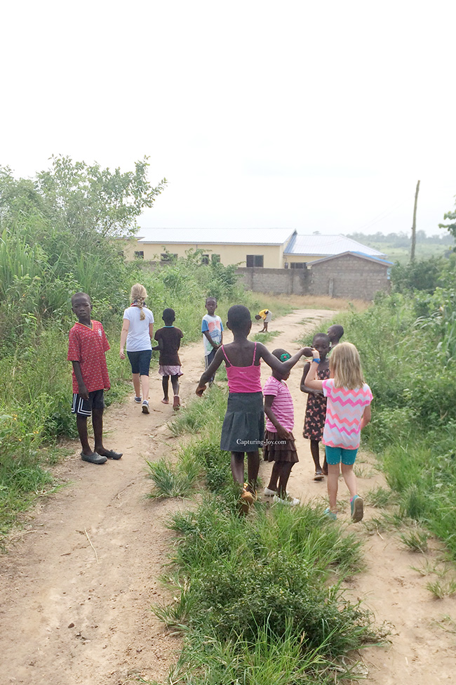 Children in Ghana holding hands