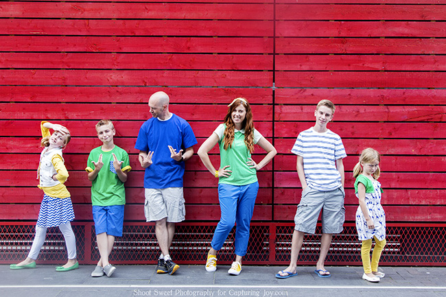 London Family Photos on Red Wall