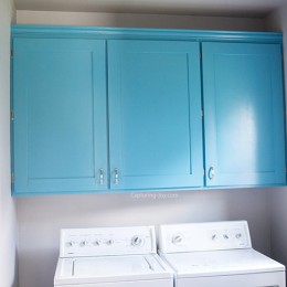 Blue custom laundry room cabinets