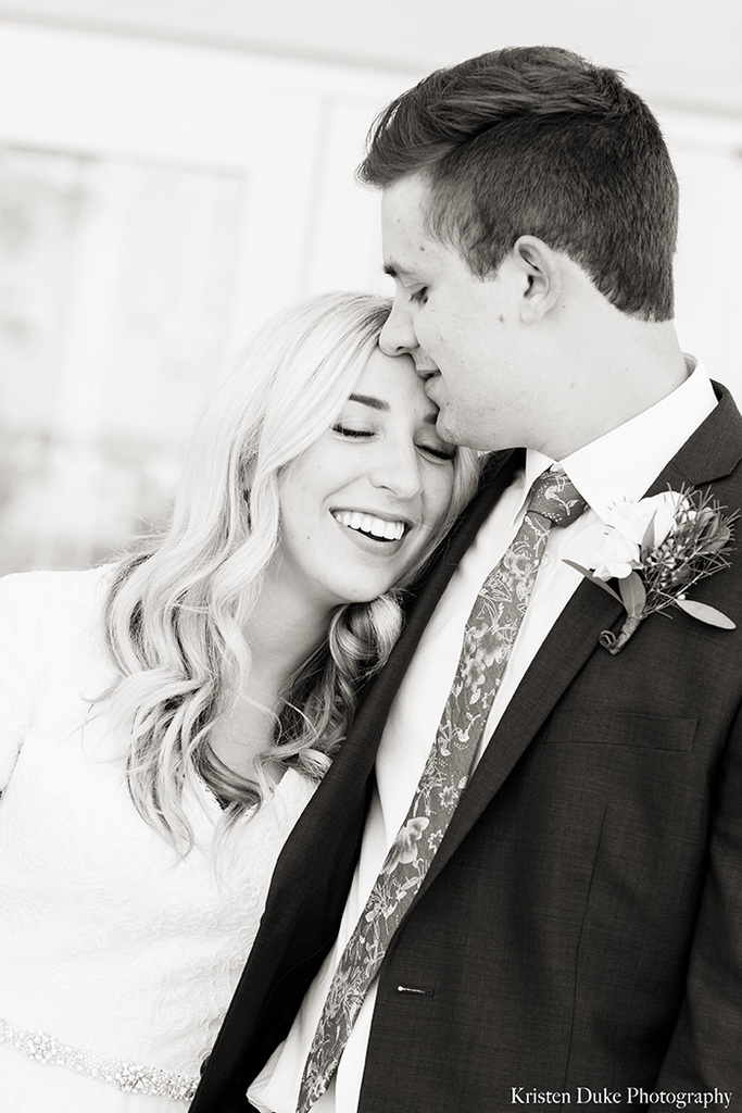 Black and white picture of bride and groom