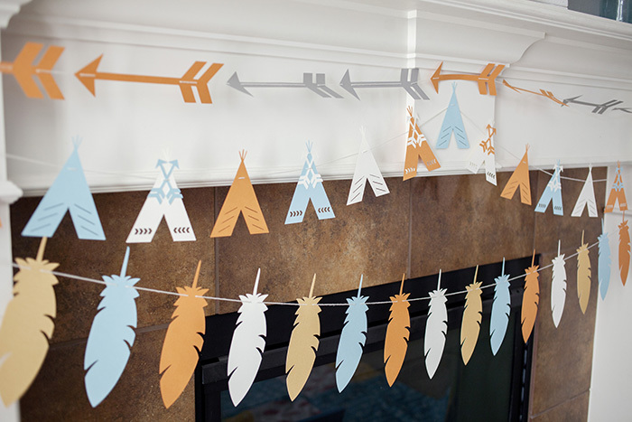 Tribal garland with feather teepee and arrow